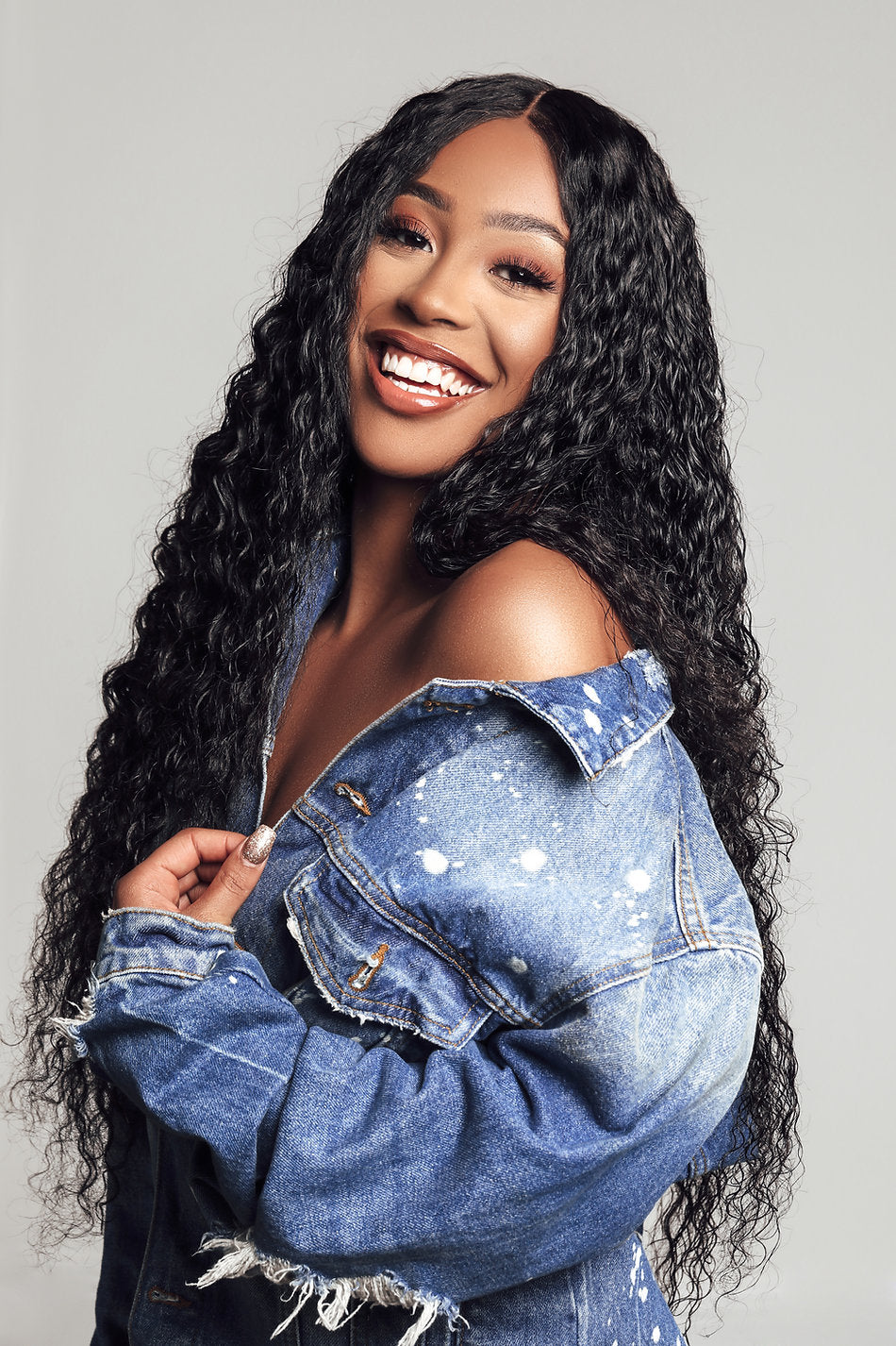 Model wearing black 24-inch HD lace human hair wig in body wave texture – Nuola Wigs.