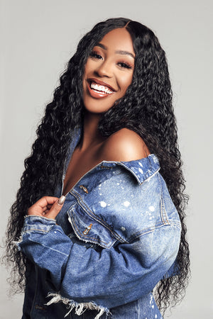 Model wearing black 24-inch HD lace human hair wig in body wave texture – Nuola Wigs.