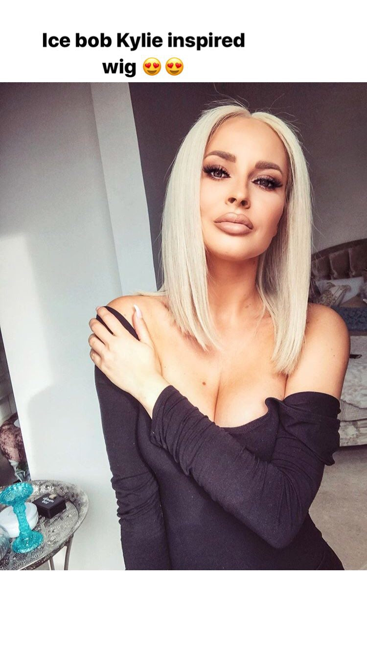 Model wearing blonde balayage 14-inch HD lace human hair wig in body wave texture – Nuola Wigs.