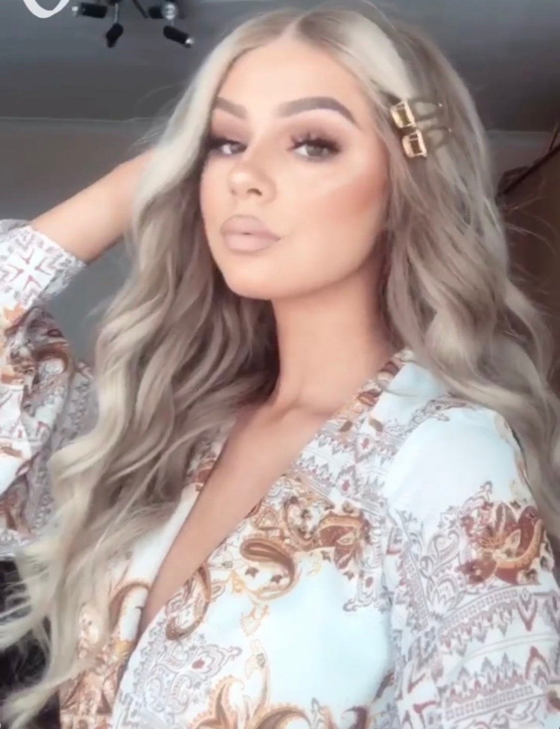 Model wearing blonde balayage 22-inch HD lace human hair wig in body wave texture – Nuola Wigs.