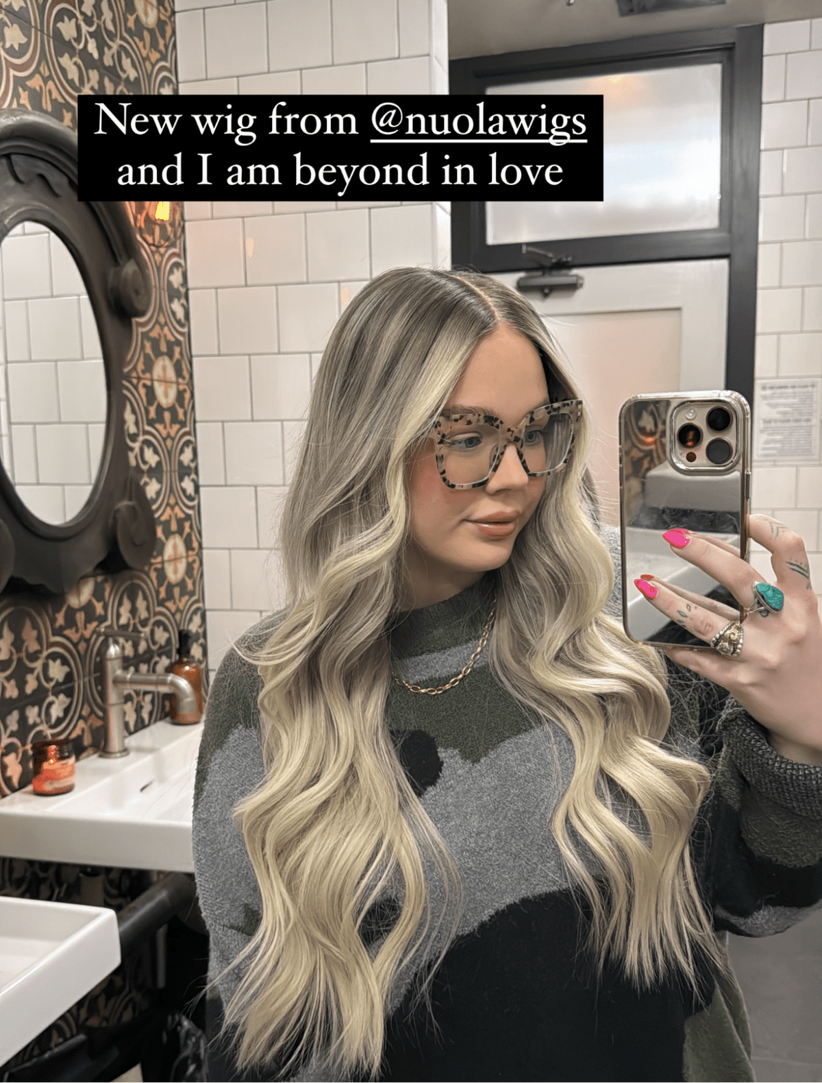 Model wearing blonde balayage 24-inch HD lace human hair wig in body wave texture – Nuola Wigs.