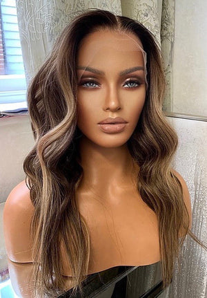 Model wearing brown balayage 18-inch HD lace human hair wig in body wave texture – Nuola Wigs.