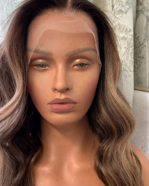 Model wearing brown balayage 18-inch HD lace human hair wig in body wave texture – Nuola Wigs.