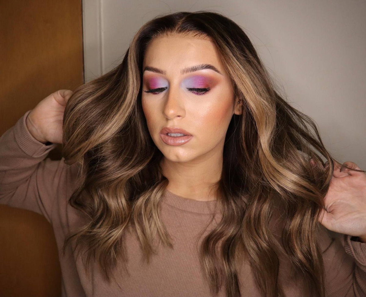 Model wearing brown balayage 20-inch HD lace human hair wig in body wave texture – Nuola Wigs.