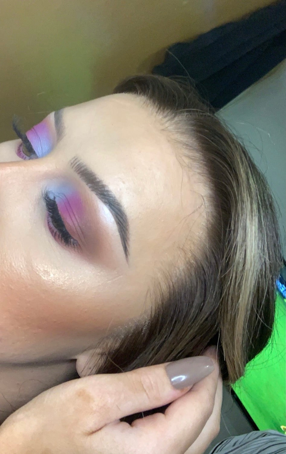 Model wearing brown balayage 20-inch HD lace human hair wig in body wave texture – Nuola Wigs.