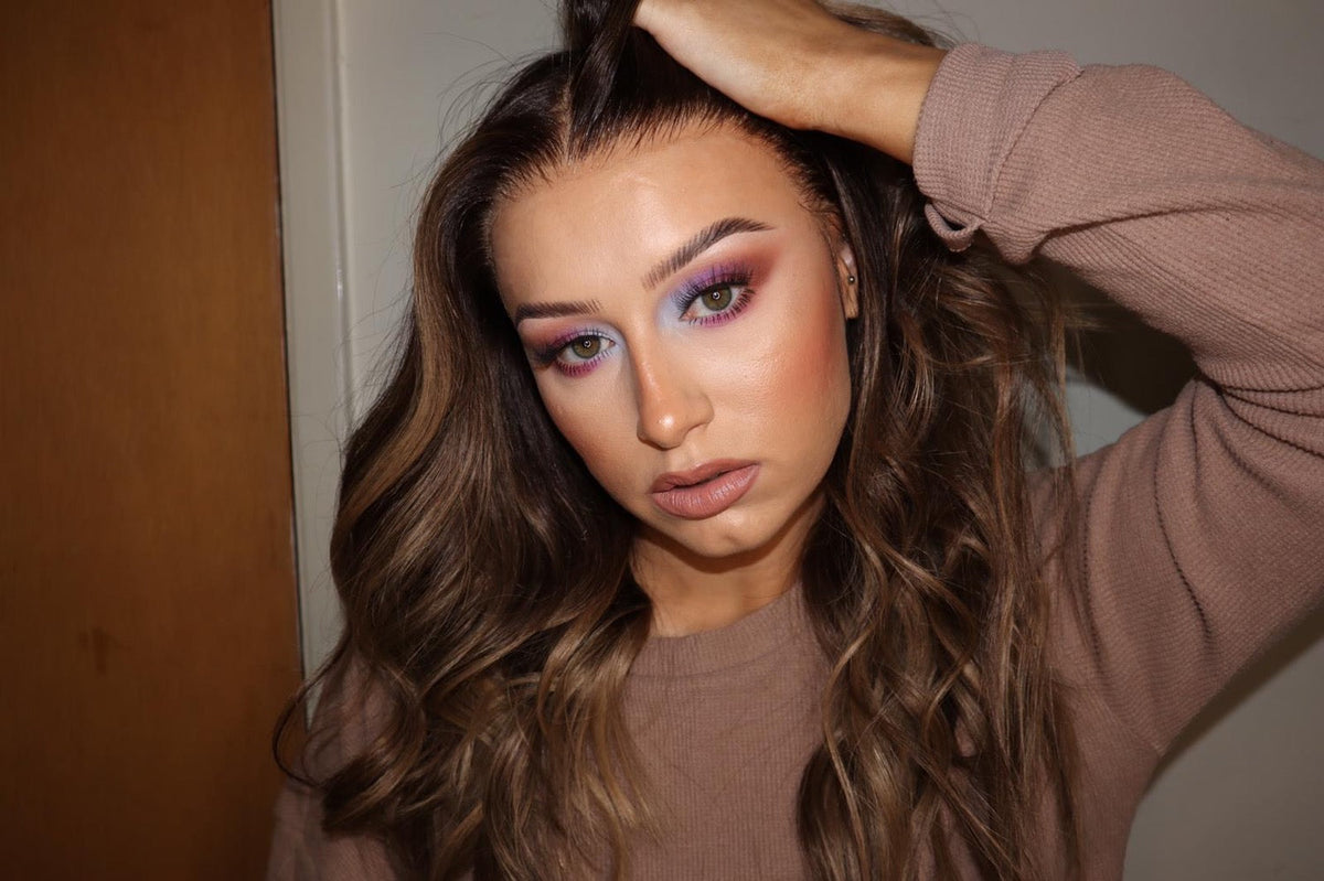 Model wearing brown balayage 20-inch HD lace human hair wig in body wave texture – Nuola Wigs.