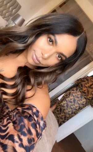 Model wearing brown balayage 20-inch HD lace human hair wig in body wave texture – Nuola Wigs.