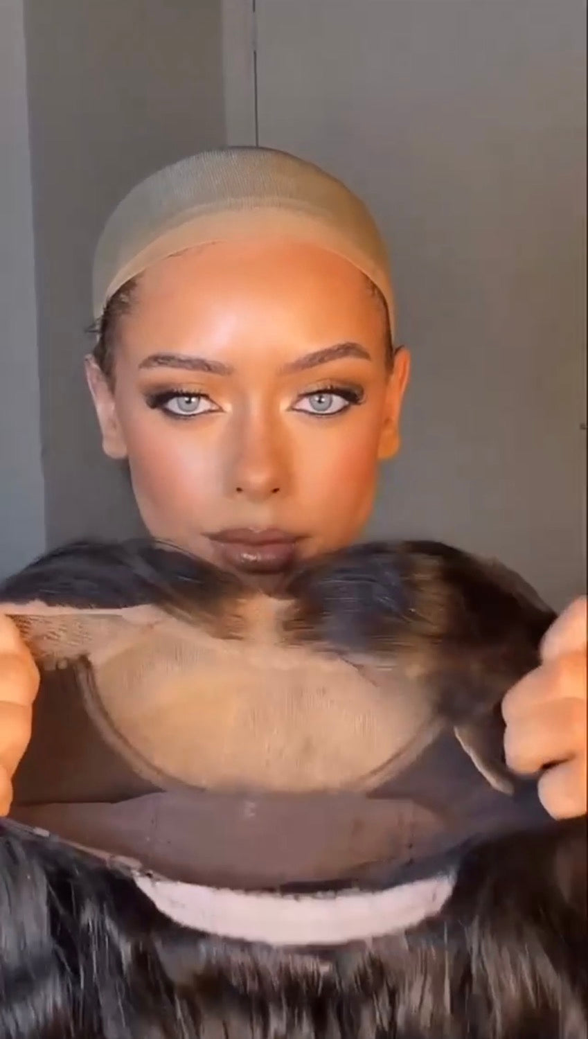 Model wearing brown balayage 20-inch HD lace human hair wig in body wave texture – Nuola Wigs.