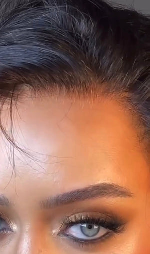 Model wearing brown balayage 20-inch HD lace human hair wig in body wave texture – Nuola Wigs.