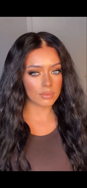 Model wearing brown balayage 20-inch HD lace human hair wig in body wave texture – Nuola Wigs.