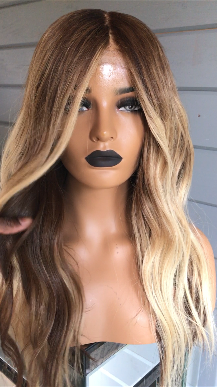 Model wearing brown balayage 20-inch HD lace human hair wig in body wave texture – Nuola Wigs.