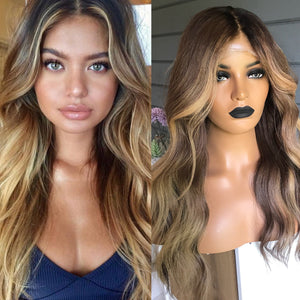 Model wearing brown balayage 22-inch HD lace human hair wig in body wave texture – Nuola Wigs.