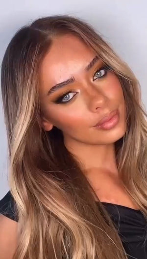 Model wearing brown balayage 22-inch HD lace human hair wig in body wave texture – Nuola Wigs.