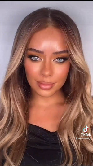 Model wearing brown balayage 22-inch HD lace human hair wig in body wave texture – Nuola Wigs.