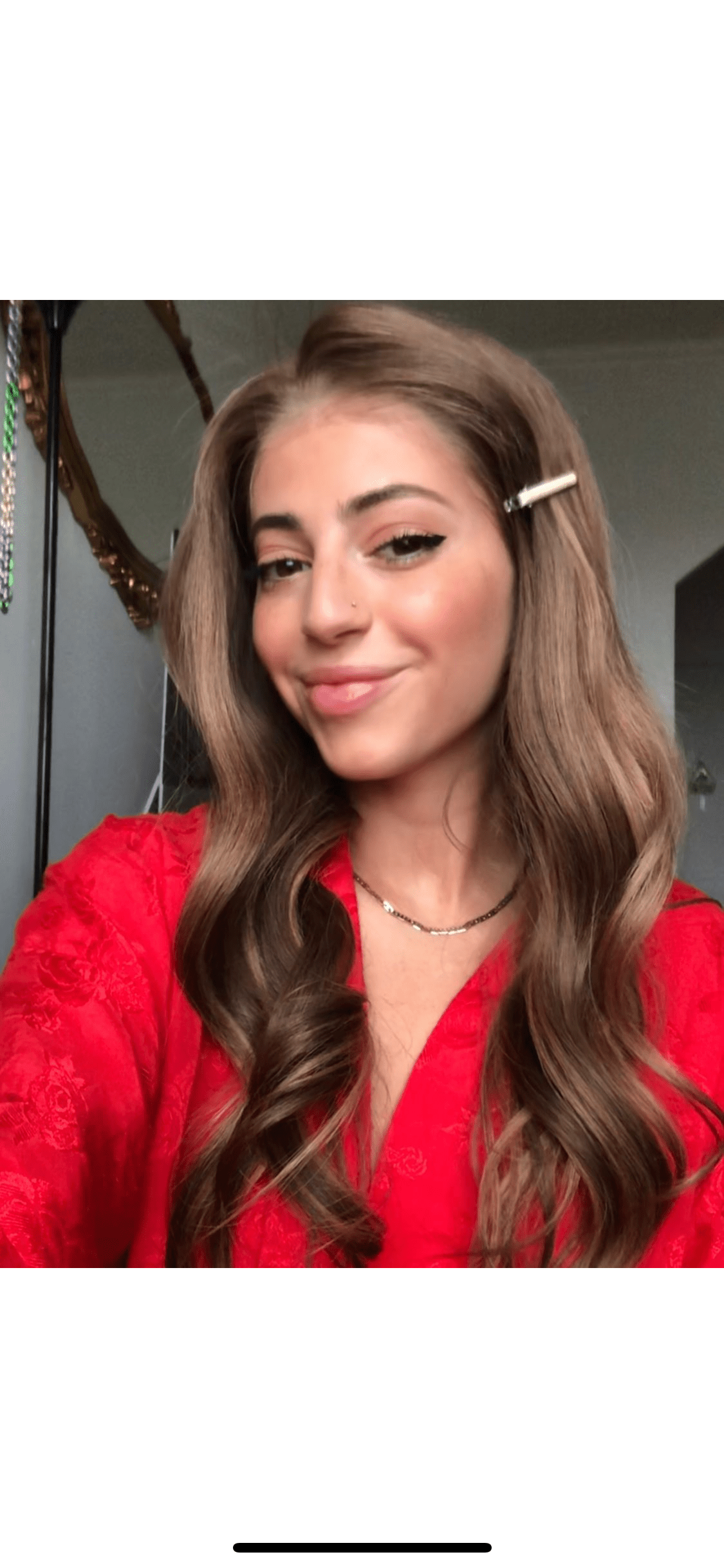 Model wearing brown balayage 22-inch HD lace human hair wig in body wave texture – Nuola Wigs.