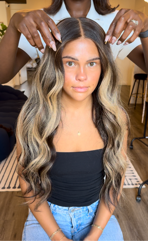 Model wearing brown balayage 26-inch HD lace human hair wig in body wave texture – Nuola Wigs.