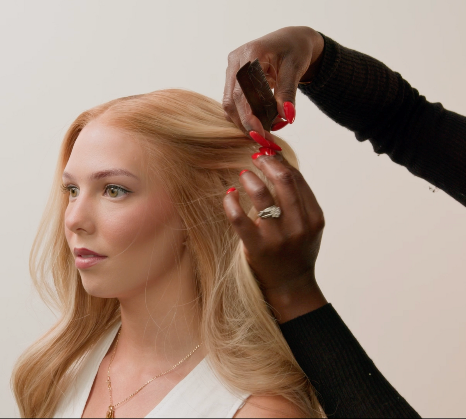 Customer receiving adjustments for human hair wig in Oakville, Ontario